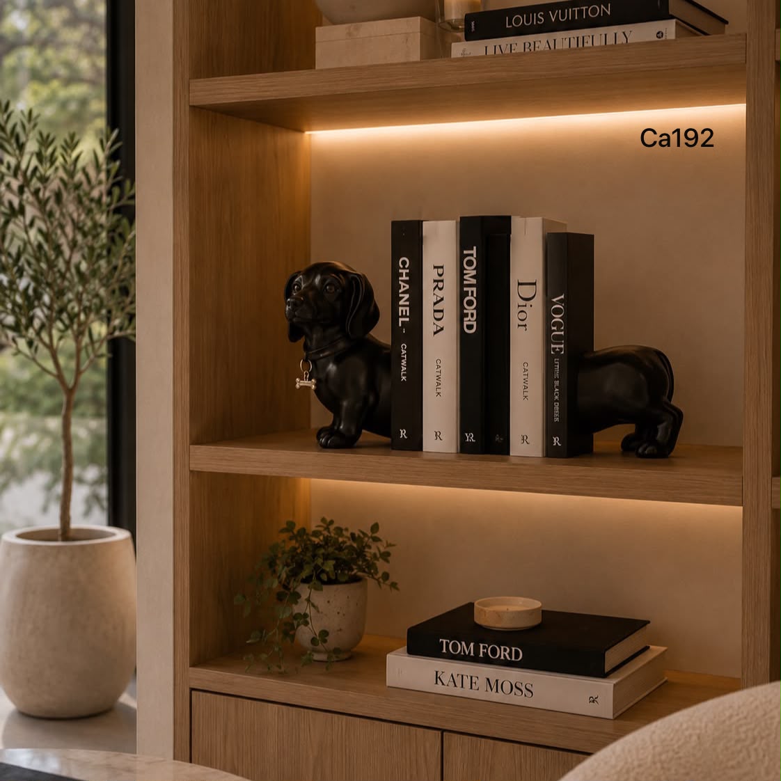 Articulo decorativo perro salchicha negro cuña libros 13cm* 18cm
